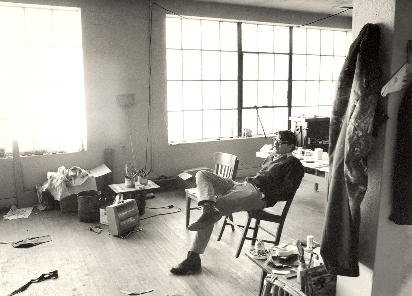 Portrait of Richard  Diebenkorn. Richard Diebenkorn in his studio at Ashland Avenue and Main St, Santa Monica, CA, c. 1970.<br>Photograph by Richard M. Grant.