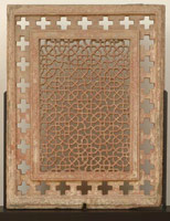 Unknown (India, Mughal) / 
      Pierced Window Screen (Jali), late 16th - early 17th Century / 
      red sandstone / 
      46 1/2 x 36 x 3 in. (118.1 x 91.4 x 7.6 cm)  / 
      Private collection / 
        / 
      This pierced window
      screen, or <em>jali</em>,
      is closely related in design to red sandstone <em>jalis </em> still
      in situ at Akbar's Tomb in Sikandra, near Agra (ca. 1605-1612). 