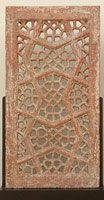 Unknown (India, Mughal) / 
      Pierced Window Screen (Jali), / 
      late 16th - early 17th century / 
      red sandstone / 
      39 3/4 x 24 x 5 in. (101 x 61 x 12.7 cm) / 
      Private collection / 
        / 
      The surface pattern of this <em>jali </em> is extremely close in design
      to the pierced window screens that enclose the courtyard of the Great
      Mosque (ca. 1571) at Fatehpur Sikri, the erstwhile Mughal capital.