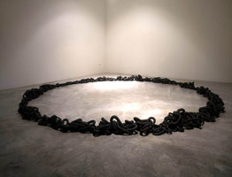 Untitled (ring of chain), 1995 / 
steel chain / 
145 in (368.3 cm) in diameter