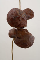 Alison Saar / 
      Kiss on a Rope, 2001 / 
      mixed media / 
      72 x 16 x 17 in. (182.9 x 40.6 x 43.2 cm) / 
      Private collection 