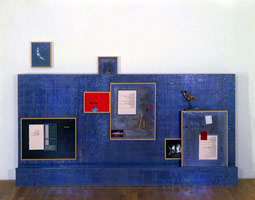 Terry Allen / 
The First Day, 1983 / 
mixed media / 
60 x 96 x 11 in. (152.4 x 243.84 x 27.94 cm) / 
Private collection