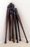 Alison Saar / 
Bat Boyz, 2001 / 
baseball bats, tar / 
34 x 12 x 12 in. (86.4 x 30.5 x 30.5 cm) / 
Private collection