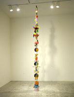 Don Suggs / 
American Feast Pole #2 (Cocky), 2002 / 
plastic objects and oil paint / 
158 x 18 x 18 in (401.3 x 45.7 x 45.7 cm)