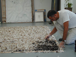 EMC working on painting of tar and feathers for Schneebett. / La Brea studio, Los Angeles, 2004 