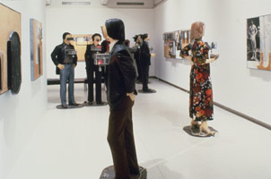 Edward & Nancy Reddin Kienholz / 
The Art Show, 1963 - 77 / 
tableau: plaster casts, clothing, Plexiglass boxes, recorded sound, automobile air conditioning vents and fans, furniture, drawings, books, punch bowl, glasses, and tablecloth / 
dimensions variable  / 
Collection of the Berlinische Galerie, Berlin, Germany