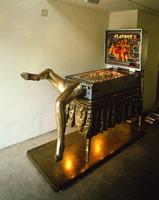 Edward & Nancy Reddin Kienholz / 
The Bronze Pinball Machine with Woman Affixed Also, 1980 / 
mixed media assemblage / 
74 x 41 x 82 in. (188 x 104.1 x 208.3 cm) / 
Private collection