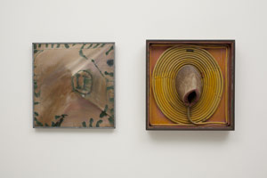 Edward Kienholz / The American Way, II, 1960 and 1970 / paint and resin on rubber garden hose with severed deer neck mounted on wood; / once covered with paint and watercolor on canvas (left image), subsequently removed by the artist (right image) / 22 3/4 x 22 1/4 x 8 in (57.8 x 56.5 x 20.3 cm) / 
Courtesy of Susan Camiel, from the Dorothy and Michael Blankfort Collection