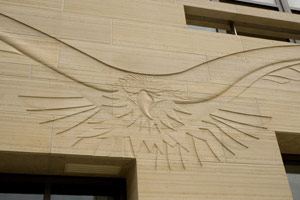  Gwynn Murrill / 
Intaglio carving of eagle set into limestone panels / 
Approximately 114 x 504 in. (290 x 1280 cm)