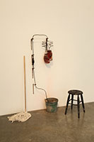 Alison Saar / 
Black Lightening, 2012 / 
glass, shoestrings, found mop and bucket and water / 
58 x 24 x 24 in. (147.3 x 61 x 61 cm) / 
signed on underside of bucket