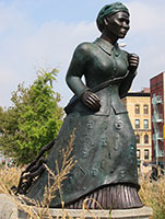 Alison Saar / 
Swing Low: Harriet Tubman Memorial, 2007 / 
Bronze / 
156 x 180 x 96 in. (396.2 x 457.2 x 243.8 cm) with base / 
Located at 122nd and St Nicholas Pl, Harlem, New York