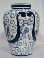 Eduardo Sarabia / 
A thin line between love and hate 37, 2005 / 
hand painted ceramic vase and silkscreen box / 
Object: Height: 12 1/2 & Diameter: 8 1/2 in.
(31.8 x 21.6 cm) / 
Box: 14 x 13 1/2 x 17 1/2 in. (35.6 x 34.3 x 44.5 cm) / 
Private collection 