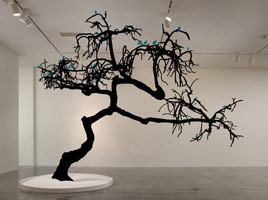Rebecca Campbell / 
Do You Really Want to Hurt Me, 2009 / 
      tree: avocado tree, steel, velvet, and fiberglass; / 
      birds: Windex, glass, and bronze / 
      overall: 13' x 16 ' x 18'