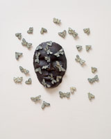 Alison Saar / 
Lunarseas: Sea of Serenity, 2008 / 
cast bronze, edition of five unique variations / 
16 x 15 x 1 1/2 in. (40.6 x 38.1 x 3.8 cm)