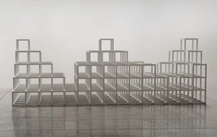 Sol LeWitt / 
Structure with Three Towers, 1986 / 
wood painted white / 
48 x 138 x 48 1/2 in. (121.9 x 350.5 x 123.2 cm)