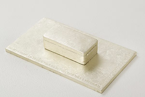 Yoko Ono / 
Disappearing Piece (Bronze, cast of 1965 version), 1988 / 
Bronze / 
1 1/4 x 7 x 4 in. (3.2 x 17.8 x 10.2 cm) / 
Edition 6 of 9