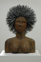 Mo'fro, 2006 / 
      wood, tin & barbed wire / 
      33 x 21 1/2 x 18 in. [83.8 x 54.6 x 45.7 cm] / 
      Private collection