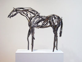 Deborah Butterfield / 
Blackwood, 2006 / 
cast bronze / 
42 x 53 x 16 in. (106.7 x 134.6 x 40.6 cm) / 
Private collection New York, NY