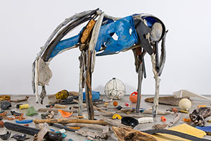 Deborah Butterfield / 
Three Sorrows (quake, tsumani, meltdown from
Gretel Ehrlich in Facing the Wave), 2016 / 
Cast bronze, wood, plastic and wire primary element: 81 x 100 x 40 in. (205.7 x 254 x 101.6 cm) / 
found floor objects: dimensions variable