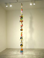 Don Suggs / 
American Feast Pole #2 (Cocky), 2002 / 
        plastic objects and oil paint / 
        158 x 18 x 18 in. (401.3 x 45.7 x 45.7 cm) 