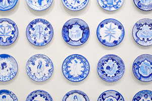 Eduardo Sarabia / 
History of the World, 2008 / 
hand painted ceramic plates / 
each 12.6 in. (32 cm)