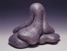 Wide Load, 2004 / 
acrylic on fired ceramic / 
18 H x 23 x 19 1/2 in (45.7 x 48.4 x 49.5 cm) / 
Base size: 44 H x 34 x 34 in (117.8 x 86.4 x 86.4 cm) / 
Private collection
