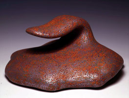 Ken Price / 
Flare, 2000 / 
acrylic on fired ceramic / 
11 1/2 x 23 1/2 x 23 1/2 in (29.2 x 59.7 x 59.7 cm) / 
Private collection 