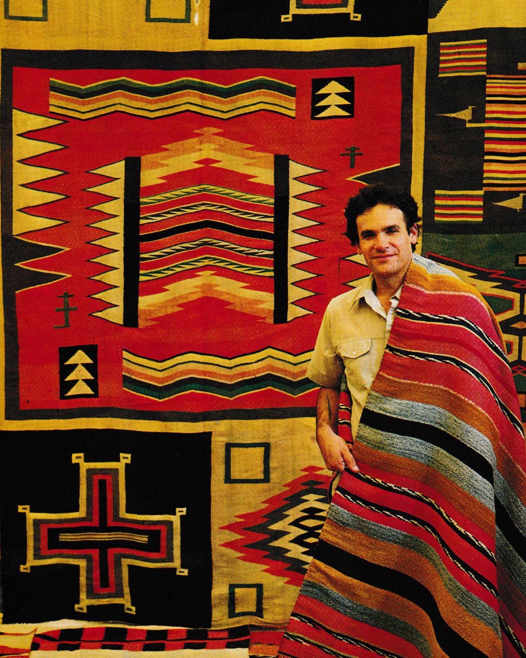 Tony Berlant with Navajo textiles from his collection, 1979, photo by Dan Budnik.